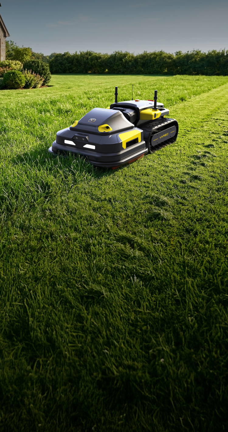 Yarbo robot lawn mower on a grassy field with trees in the background