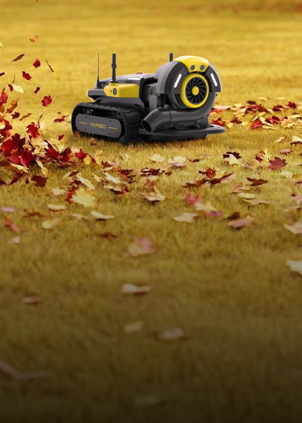 Yarbo leaf blower on a grassy field with autumn leaves