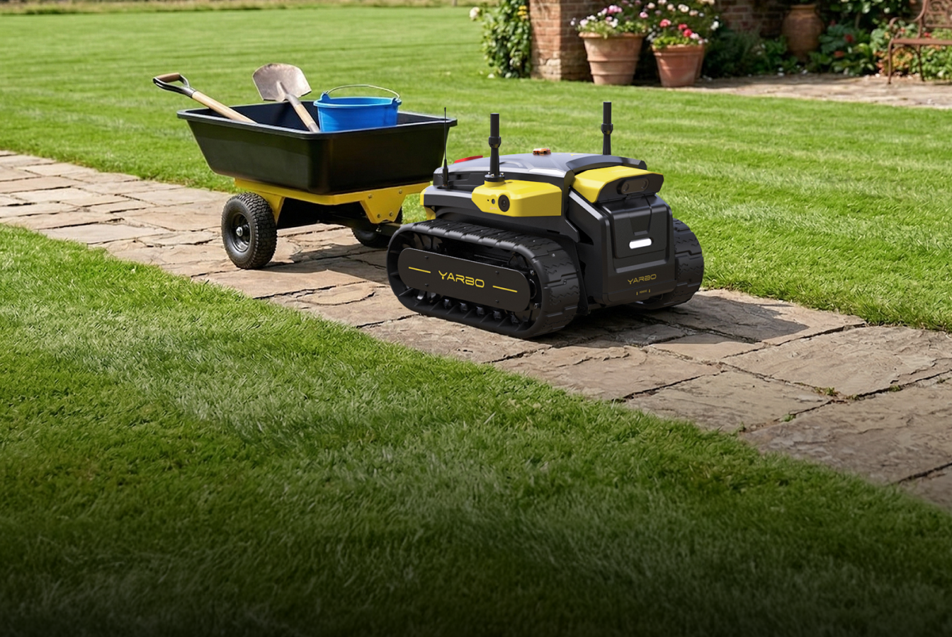 Yarbo Core autonomous robot towing a garden cart with tools along a stone path
