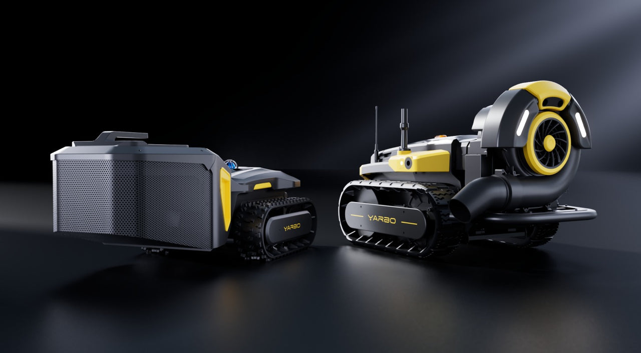 Yarbo's leaf blower unit with black and yellow coloring, blow fan, leaf chute, and all-terrain wheels.