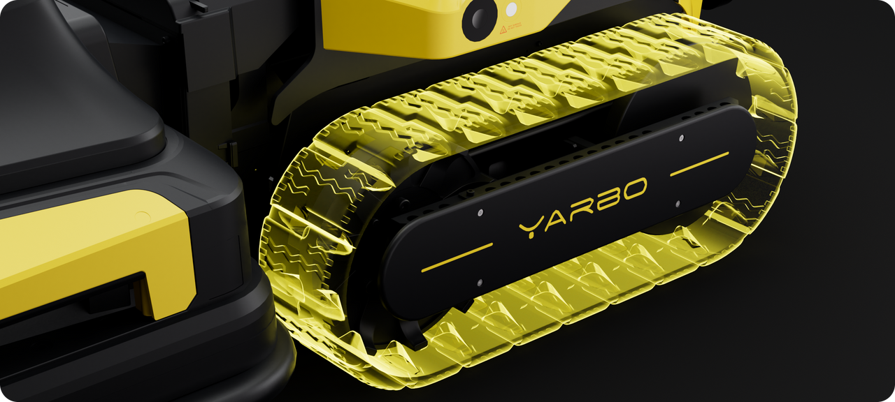 Close-up of Yarbo's patented multi-terrain rubber tracks with deep-grip tread pattern for traction on grass, slopes, and uneven ground