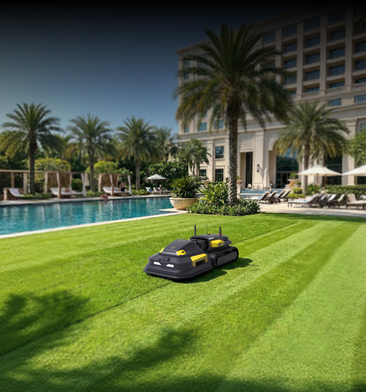 Yarbo Lawn Mower Pro mowing a manicured lawn beside a luxury property pool, demonstrating wide cutting coverage per pass
