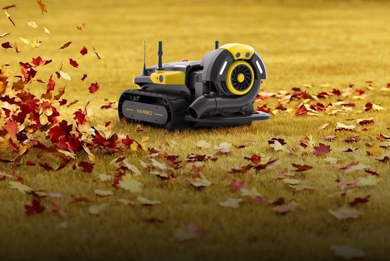 Yarbo leaf blower on a grassy field with autumn leaves